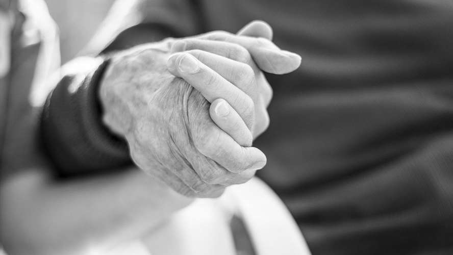 Two hands intertwined