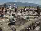 Training school - people studying ruins