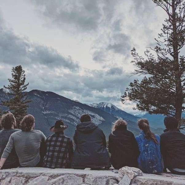 Students on their year abroad sitting on a mountain