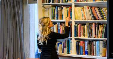Researcher using theology and bible translation resources