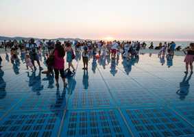 Environmental Sciences People on Greeting to the Sun sculpture in Croatia