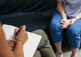 Therapist taking notes