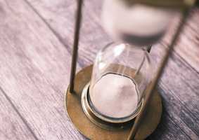 Sand timer on a table