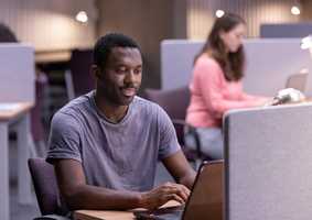 Postgraduate Student on Laptop