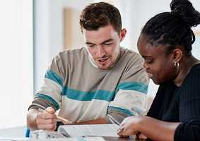 Economics students studying