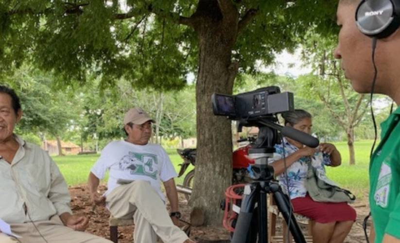 Filming a video with the community of Lomerio